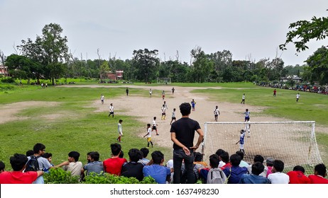 Dharan, Nepal- June 5 2017: Students/ Youths Enjoying Local Football Match In A Football Ground In Nepal.