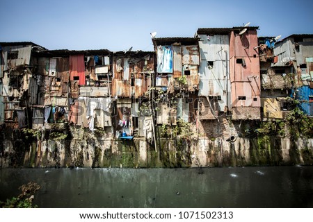 Dharavi slums on a river bank, Mumbai