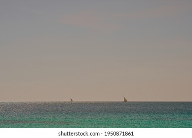 Dhow Boats Sailing At Sea During The Day