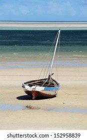 Dhow On A Sand Bank, Mozambique. Portrait.