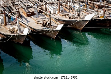 Dhows (Arabic Style Passenger Boats) On A Boat Jetty