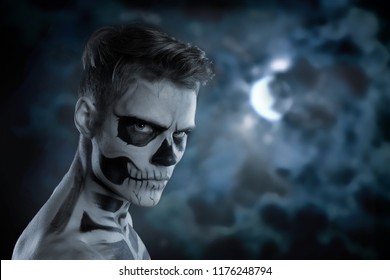 Dia de los Muerto Costume - Day of the dead is a mexican holiday. Here is a man with skull face - Powered by Shutterstock