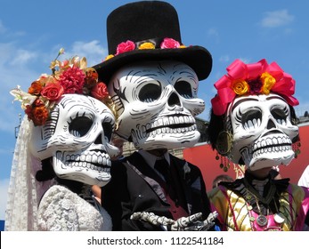 Dia de los Muertos, Day of the Dead. Participants of the Mexican holiday in death masks