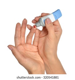 Diabetes diabetic concept finger prick for glucose sugar measure level blood test on white background