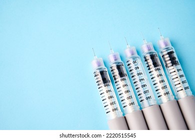 Diabetes Equipment Insulin Syringe, Injection Pen. Diabetes Disease Concept, Blue Background With Copy Space