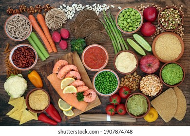 Diabetic health food low on glycemic index with foods high in protein, omega 3, antioxidants, fibre, vitamins, minerals and anthocyanins. All foods below 55 on GI index. Health care concept. Top view.