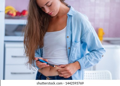 A Diabetic Patient Using Insulin Pen For Making An Insulin Injection At Home. Young Woman Control Sugar Diabetes. Diabetic Lifestyle 