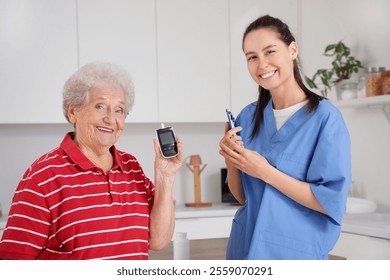 Diabetic senior woman with glucometer and doctor in kitchen - Powered by Shutterstock