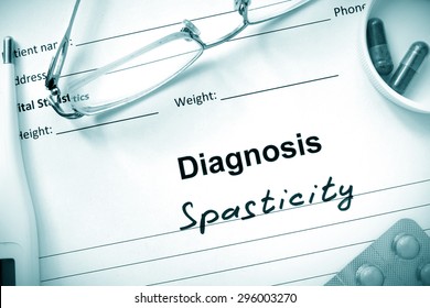  Diagnosis  Spasticity, Pills And Stethoscope.