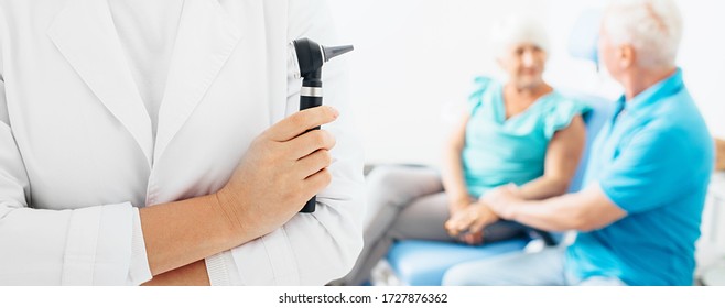 Diagnosis And Treatment Of Hearing. Doctor With An Otoscope, Hearing Test, Diagnosis Of Ear Diseases In Elderly People. Hearing Treatment.