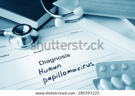 Diagnostic form with diagnosis Human papillomavirus HPV and pills.