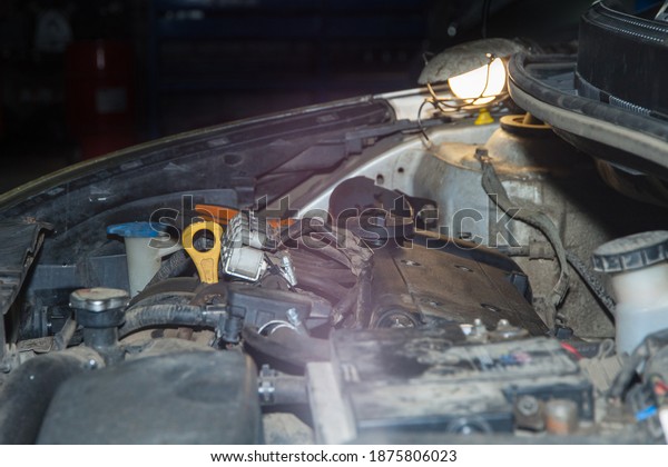 Diagnostics and repair of the car engine in the\
repair service