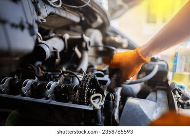 diagnostics and replacement of the gas distribution chain in a car. - Powered by Shutterstock