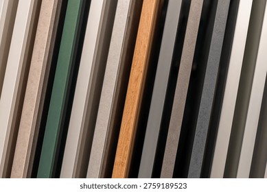 Diagonal kitchen cabinet samples with textures and colors. Modern furniture design background.