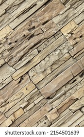 Diagonal modern brown brick wall. Background close-up.