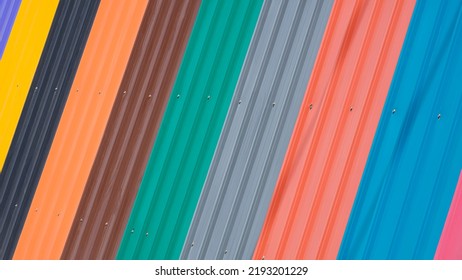 Diagonal pattern background of multicolored corrugated metal sheets for roofing on display stand