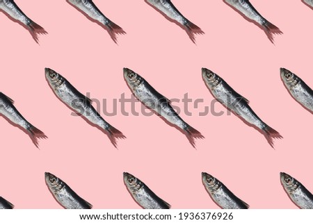 Diagonal pattern of Baltic Herring on a Pink colorbackground