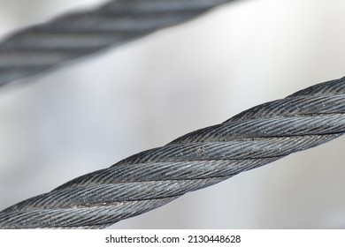 Diagonal Steel Cable Close Up. Abstract Background.