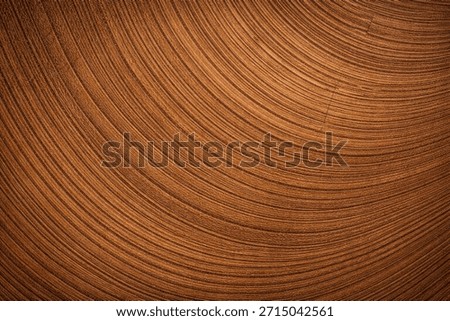 Diagonal tree ring wood texture background with curved growth lines