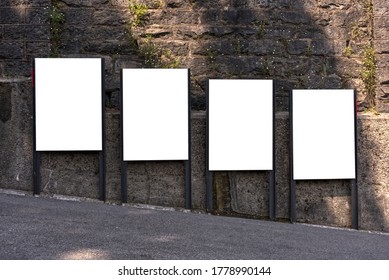 diagonally offset billboard in the city on a steep street