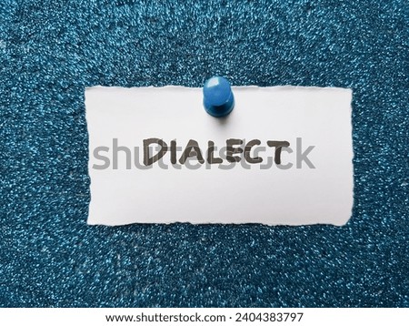Dialect writing on blue background.