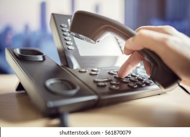 Dialing telephone keypad concept for communication, contact us and customer service support - Shutterstock ID 561870079
