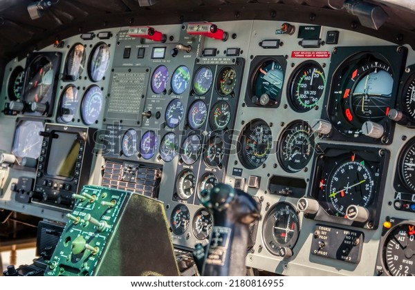 dials and gauges inside a cockpit together with\
other navigational\
systems