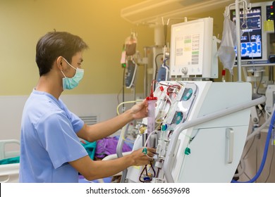 Dialysis Nurse Are Checking Dialysis Machine Before Hemodialysis Replacement Kidney Dysfunction Or Renal Failure In Intensive Care Unit.