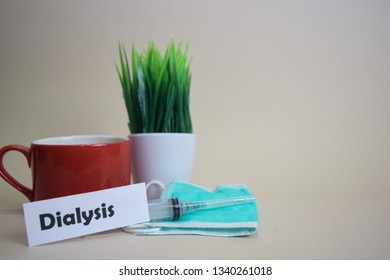 Dialysis Text, Grass Pot, Coffee Cup, Syringe, And Face Green Mask. Healtcare/Medical And Business Concept