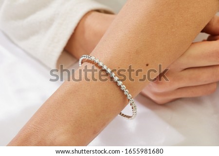 Diamond bracelet on woman hand