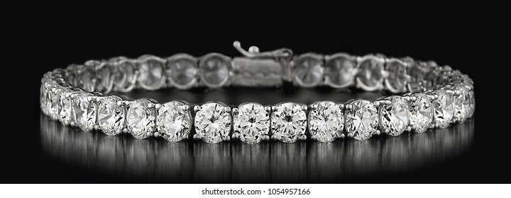 diamond bracelets on black background - Shutterstock ID 1054957166