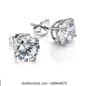 Diamond earrings. Big diamond earrings, large solitaire earrings on white background. Four prong, four claw diamond earrings with posts and backs. Round brilliant cut diamonds.  - Shutterstock ID 638464075