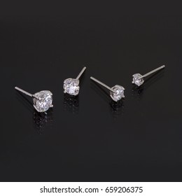 diamond earrings on black background,group,step size
 - Shutterstock ID 659206375