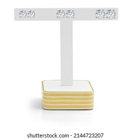 Diamond Earrings On Display Stand. White Background. Features Three Pairs Of Stud Earrings. 