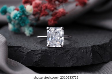 Diamond engagement ring isolated on black stone, Diamond ring for girls  - Shutterstock ID 2310633723