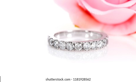 Diamond Eternity Ring With Flower Background