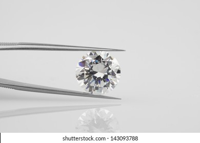 Diamond Held Within Diamond Tweezers.