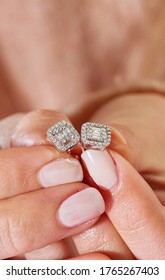 Diamond Jewellery. Diamond Earrings On Woman Hand