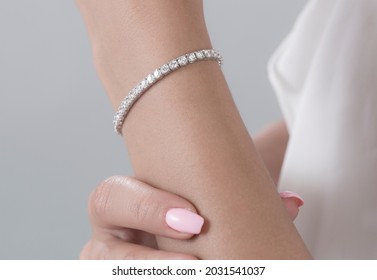 Diamond jewelry. Diamond bracelet on woman  - Shutterstock ID 2031541037