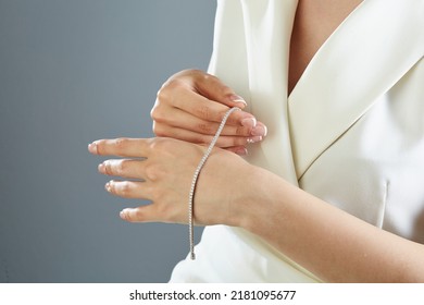 Diamond jewelry. Diamond bracelet on young woman - Shutterstock ID 2181095677