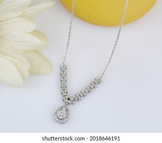 Diamond Jewelry. Diamond Necklace On Background