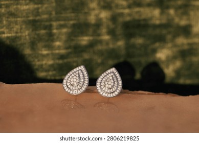 diamond leaf earrings creative flatlay
