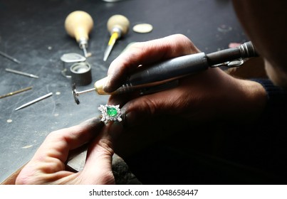 diamond making a ring' s wax mold, jewelry making witgold smith making a ring' s wax mold, jewelry making emaraland  and diamond ring - Shutterstock ID 1048658447