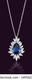 Diamond necklace sapphire on dark blue background