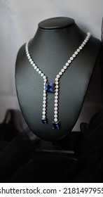 Diamond Necklace With Sophisticated Deep Blue Square Cut Diamond Shape.