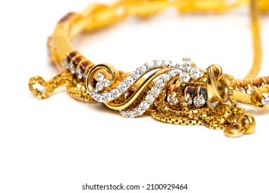 Diamond Pendent On Golden Chain Over Gold Bangle ,Modern Indian Style Jewelry. 
