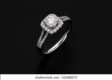Diamond ring on black background