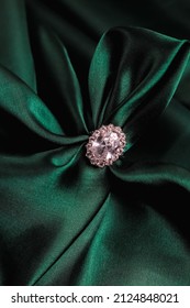 Diamond Ring On Green Silk Fabric