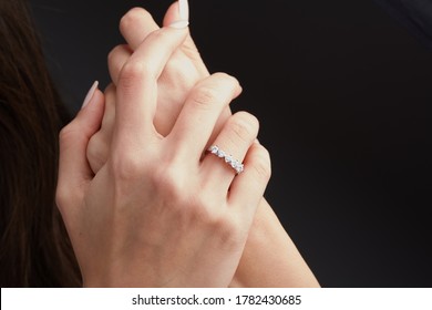 Diamond ring on young woman hand