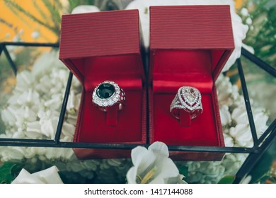 
Diamond Ring And Onyx Ring In Red Ring Box